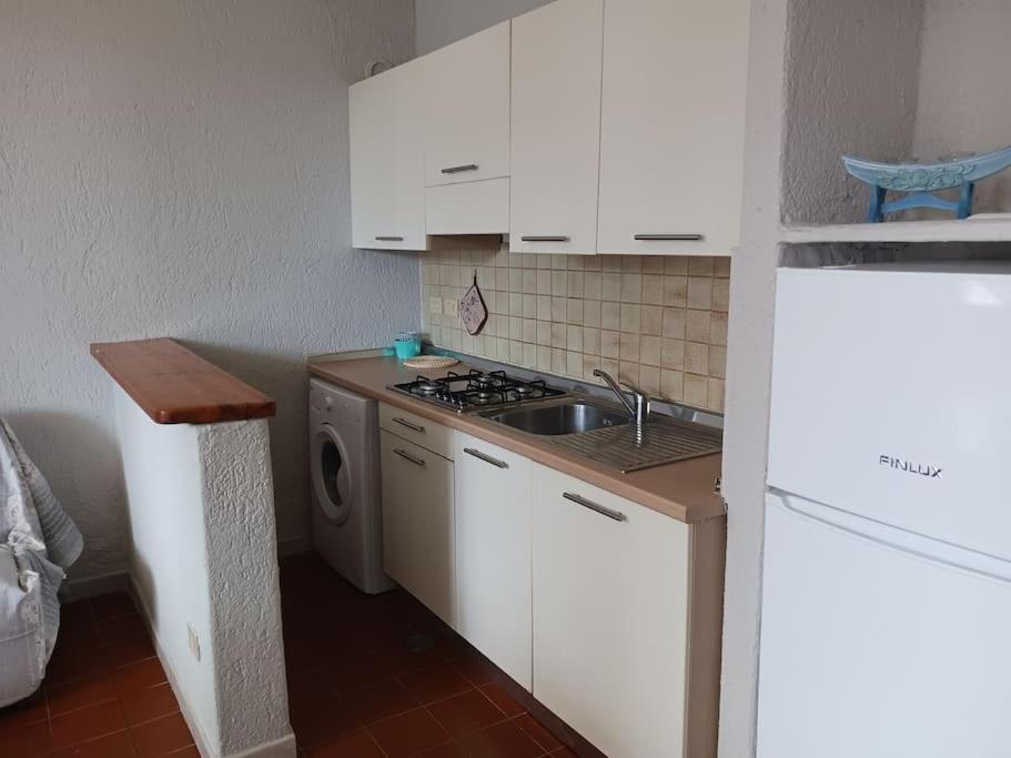 Appartamento A Baia Santa Reparata Bagian luar foto